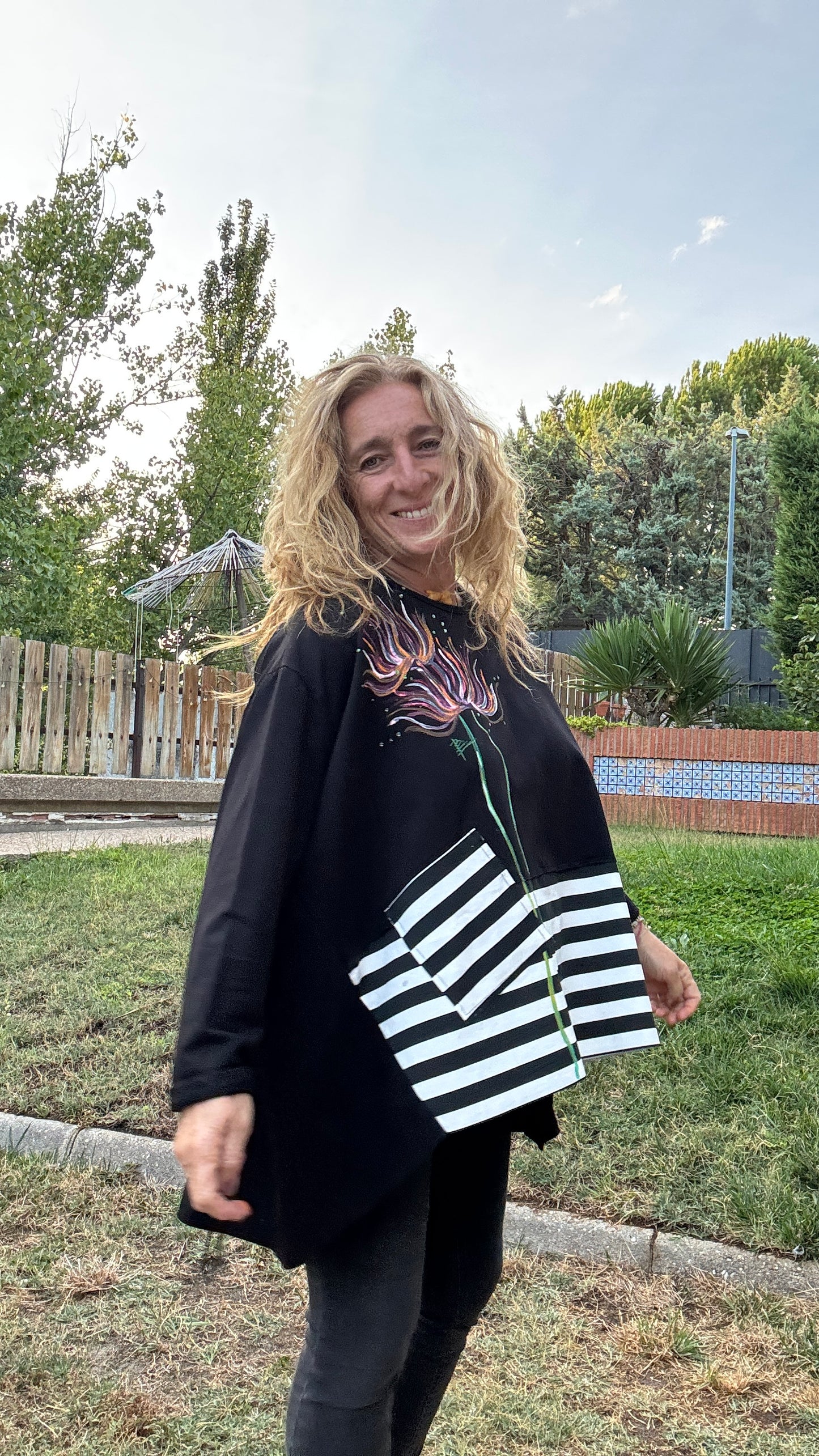Blusa raya negra