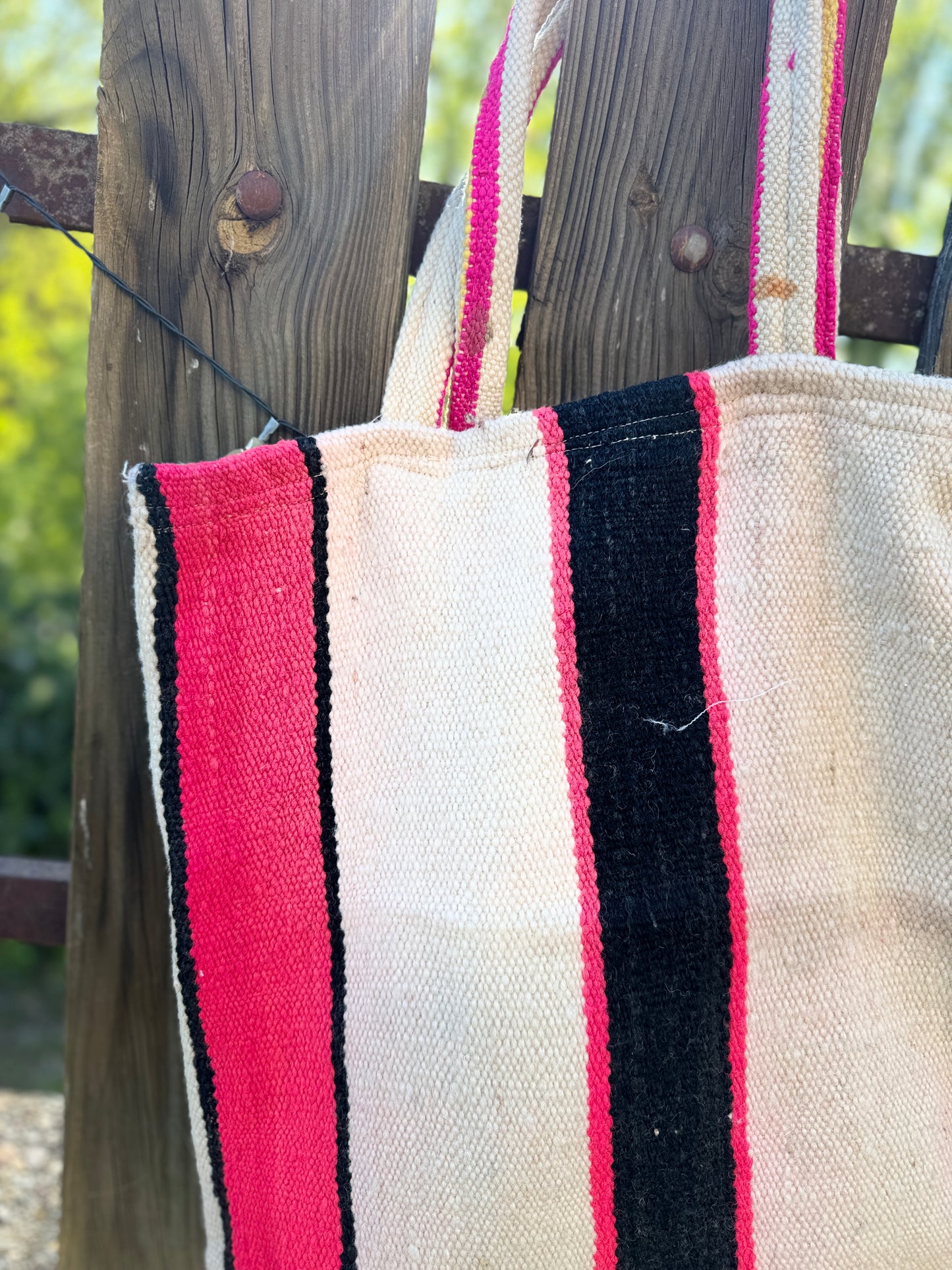 Bolso, raya fucsia